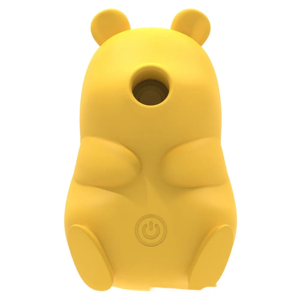 Cute bear-shaped silicone suction massage device in pink and yellow with magnetic charging cable