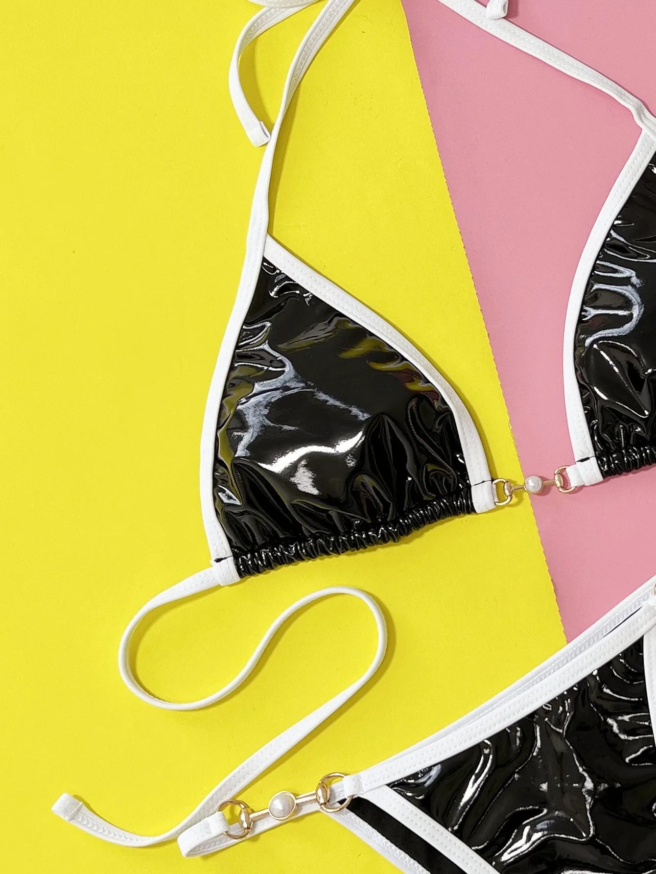 Black women's split bikini swimsuit with polyester fabric and spandex lining