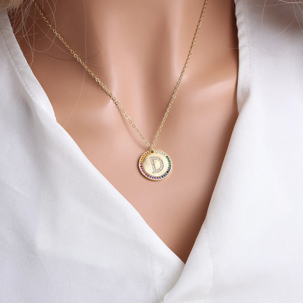 Gold English letter round pendant necklace with colourful crystals on clavicle length chain