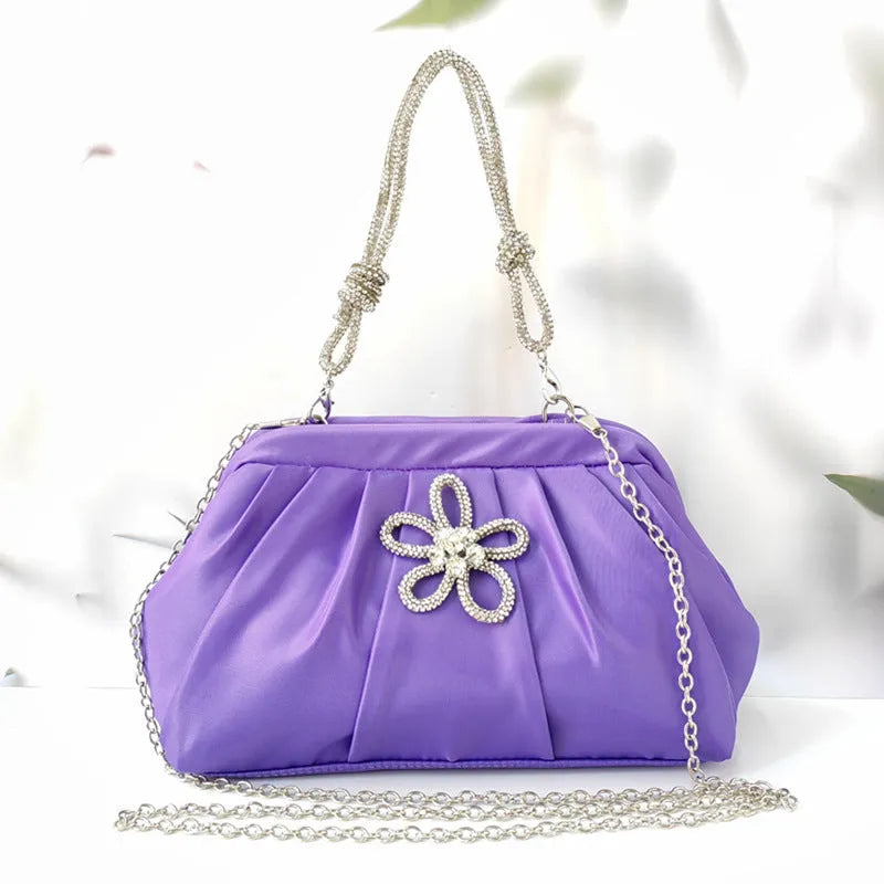 Women's soft polyester shoulder messenger bag in shell shape with folds, diamond patterns and chain accents