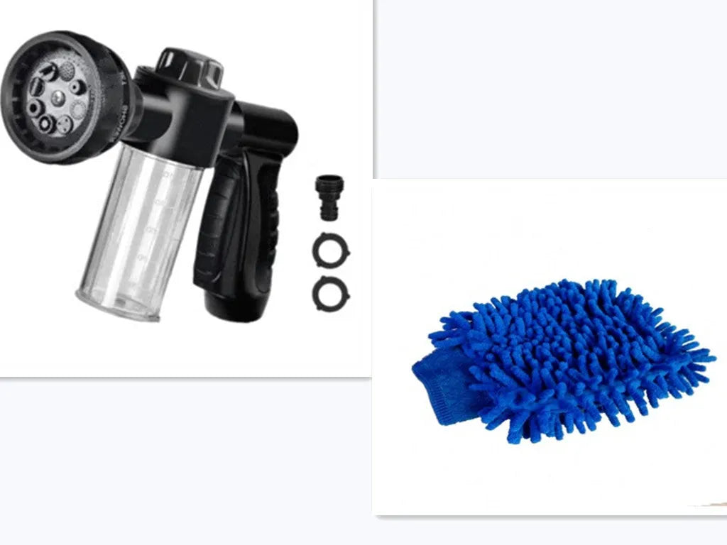 Green high-pressure foam spray gun with adjustable nozzle and attached water hose for car and garden cleaning.