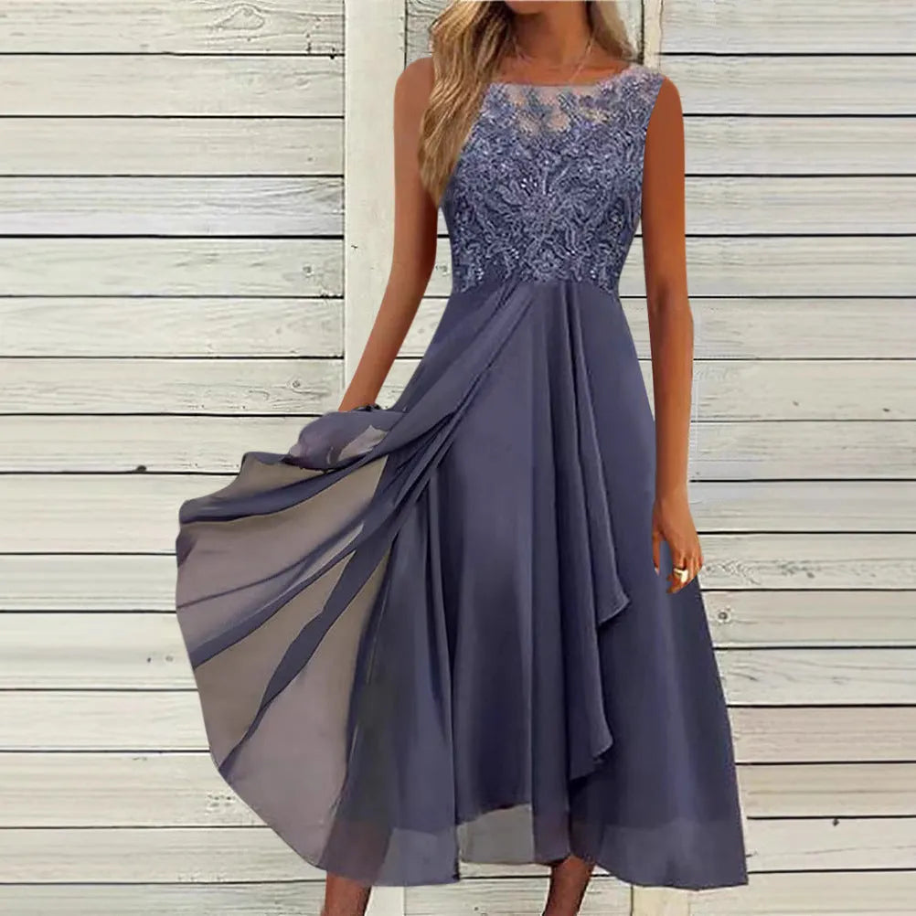 Women's sleeveless green chiffon dress with lace hollow-out detail and a mid-length princess skirt.
