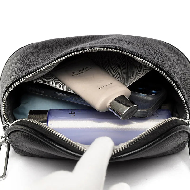 Green women's soft PU leather messenger bag with saddle shape and single shoulder strap.