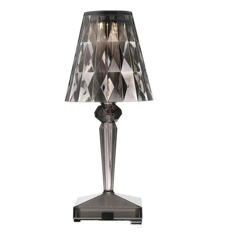Rose gold portable touch control night light on a surface, showing its acrylic lamp holder.