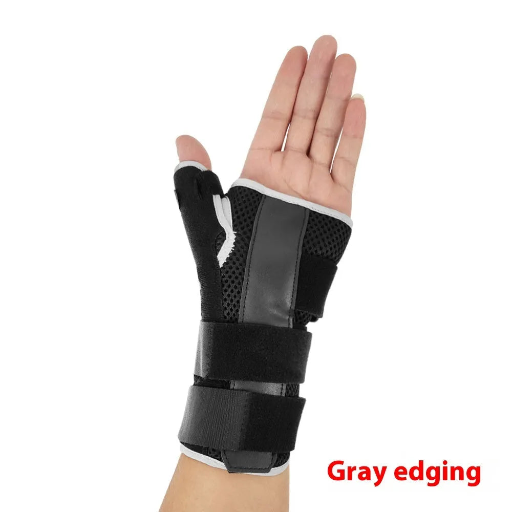 Black carbon fibre wrist guard with grey edging and an adjustable thumb strap