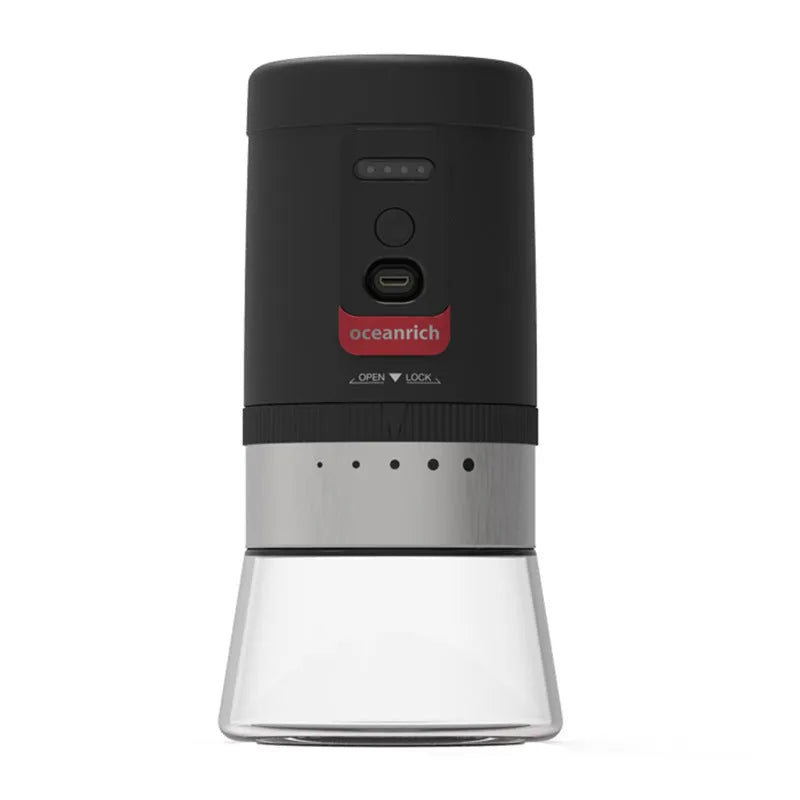 Portable black hand crank coffee grinder with manual operation for travel and home use