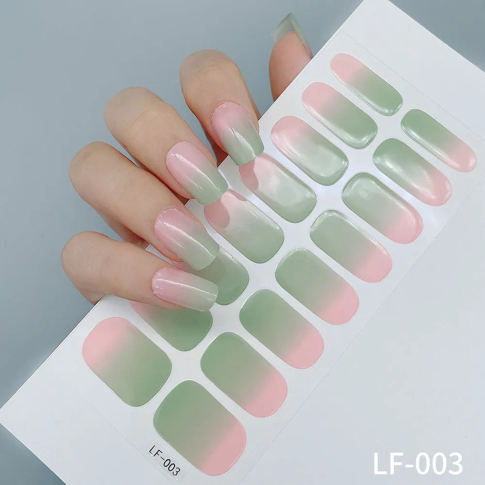 16 solid colour full nail art stickers with 22 patterns including cross, rose, butterfly designs in 12x6mm oval size