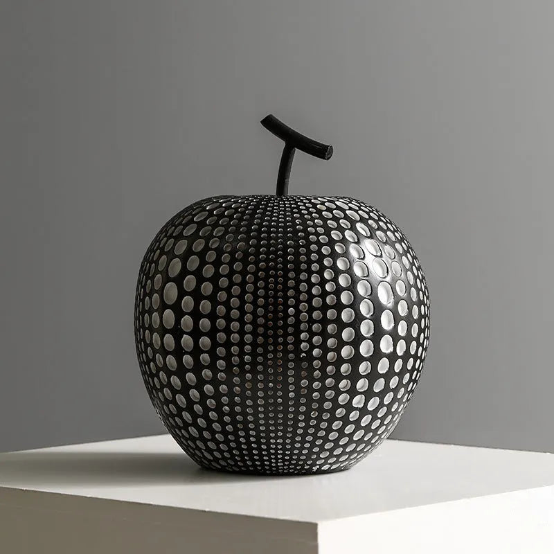 Resin apple sculpture in black, 17cm tall, smooth resin finish