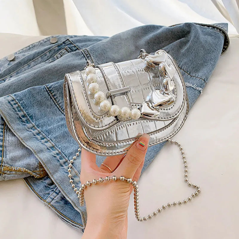 Women's laser pearl tote crossbody bag in silver colour with adjustable shoulder strap