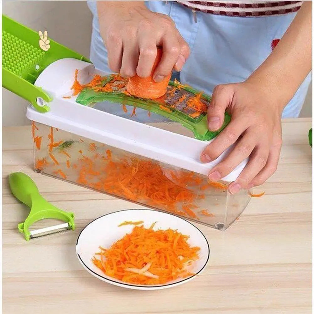 Green handheld manual food chopper with stainless steel blades on a white background.