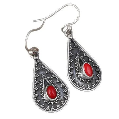 Silver drop-shaped retro earrings for women with European and American national style design.