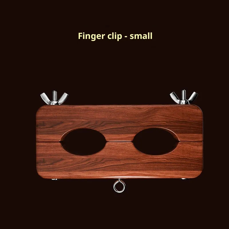 9i pear wood and alloy handcuffs in finger clip style, large size, on neutral background
