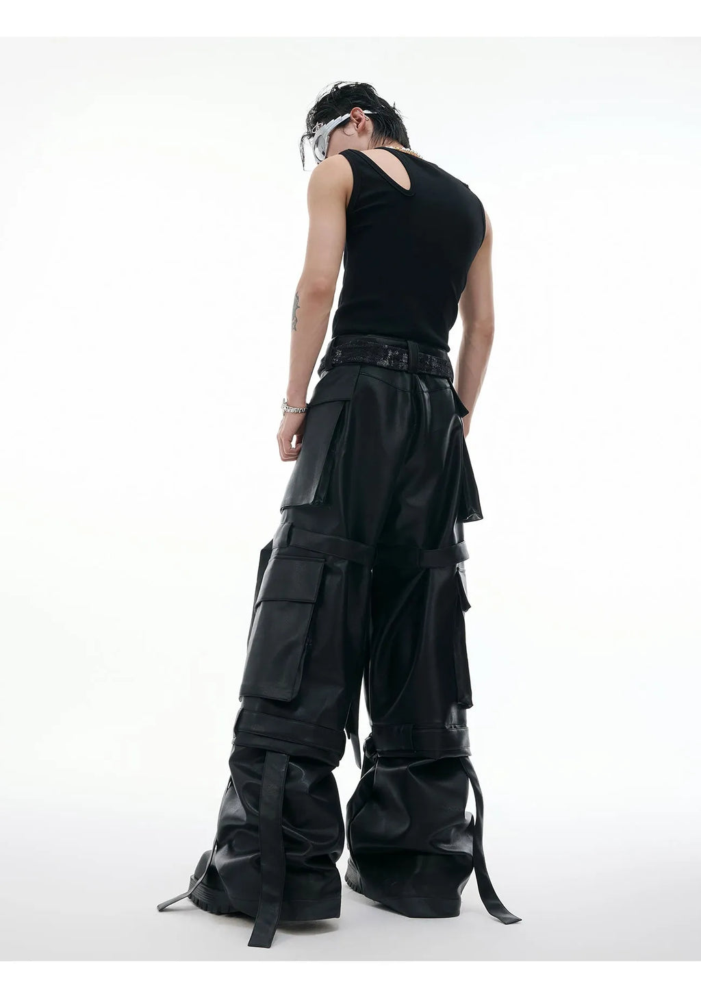 Black loose-fit retro trousers with quilted detailing and multiple pockets