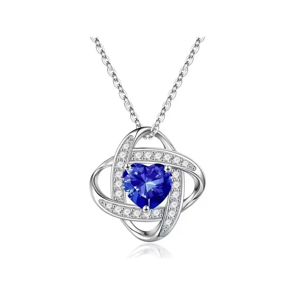 Copper heart necklace with electroplated finish in platinum diamond colours on model