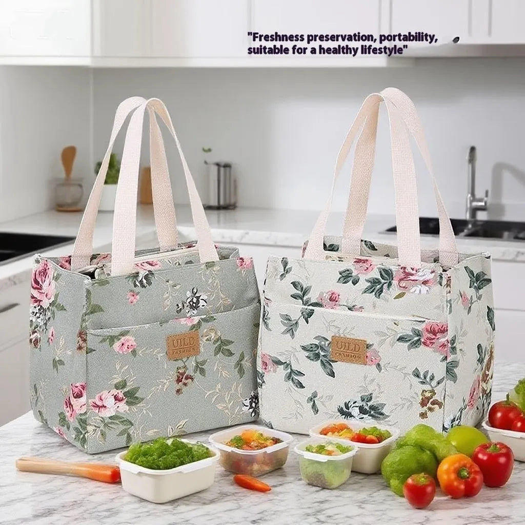 Women's large square canvas handbag with aluminium handles in a choice of printed floral and cat designs.