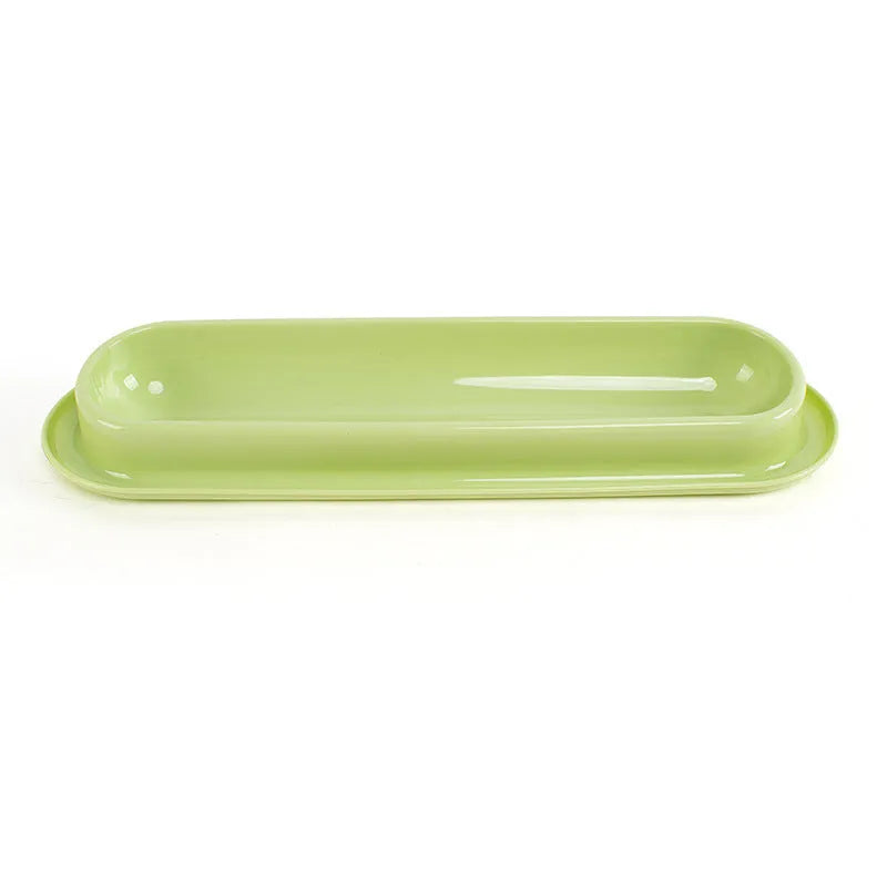 Green portable pet bowl set with two bowls and a silicone leakproof mat for cats and dogs.