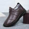 Men's brown winter cotton velvet boots with buckle fastening and a thick non-slip sole.