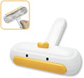 Yellow duck design portable pet hair removal hand roller with brush head.
