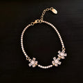 Women's copper geometric bracelet with inlaid zircon stones in gold colour
