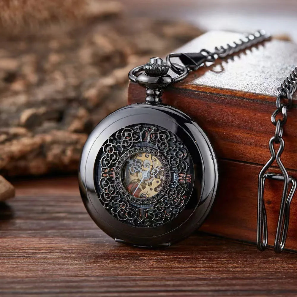 Retro mechanical pocket watch with hollow floral dial and transparent case back in alloy.