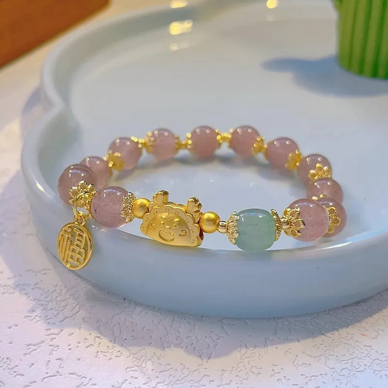 Glass floral glazed bracelet with animal zodiac modelling and electroplated red bead finish
