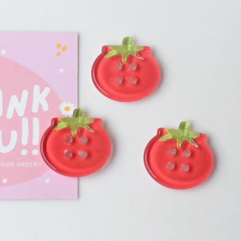 Medium plastic tomato button ornaments with printed patterns in various red colour options