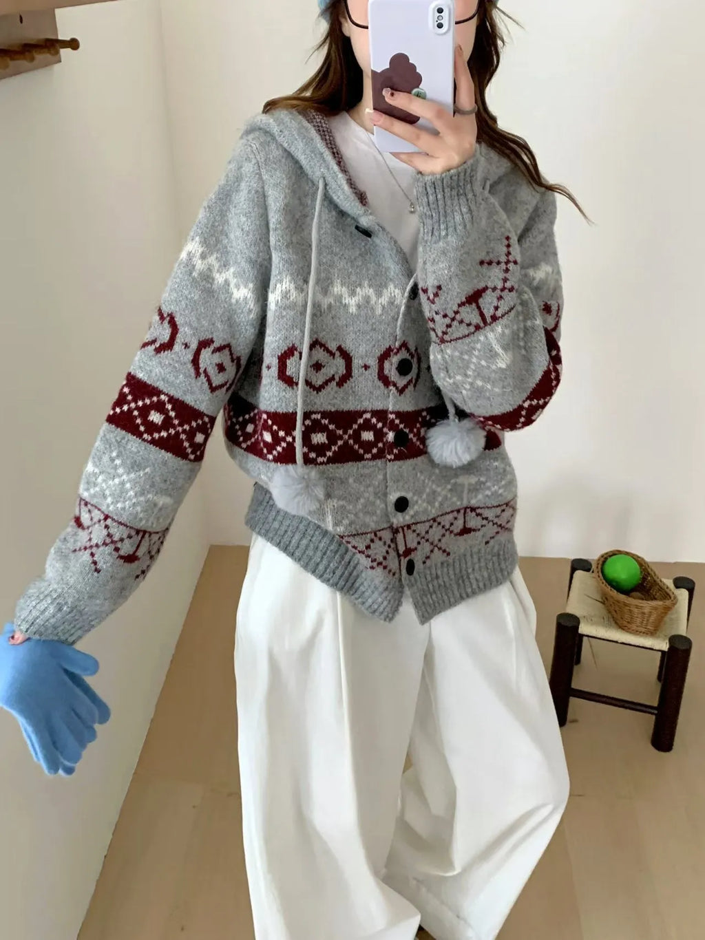 Plus size women's grey geometric pattern brocade knit sweater coat with long sleeves.