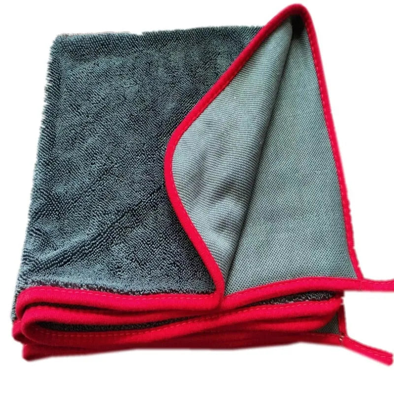 Grey microfiber car cleaning towel with black edge detailing shown in various size options