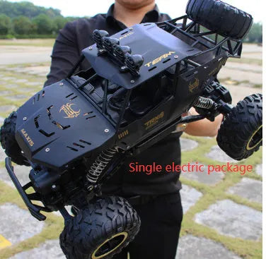 Black and silver 4WD remote control off-road climbing cars on rough terrain showing two size options.