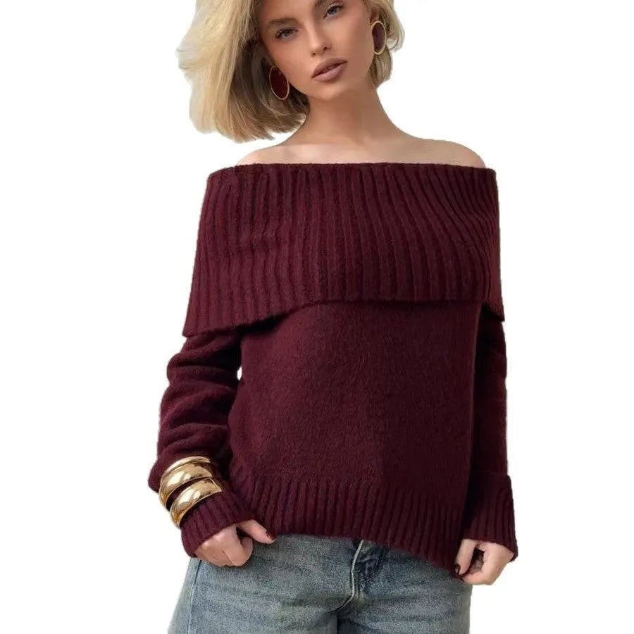 Grey off-the-shoulder sweater with a 3D textured pattern, shown on a model.