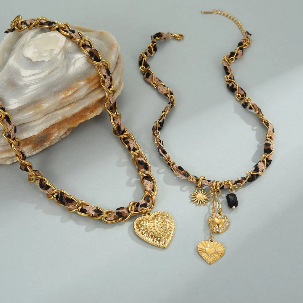Leopard print geometric heart pendant on a stainless steel chain with adjustable length