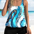 Blue tie-dye floral print plus-size women's one-piece swimsuit with adjustable shoulder straps.