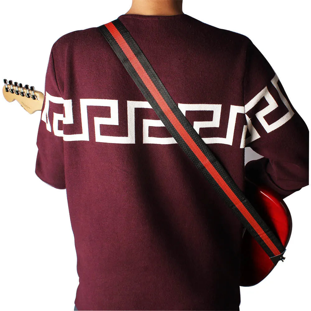 Universal woven crossbody instrument strap with quick-release clips, adjustable from 76cm to 137cm length.