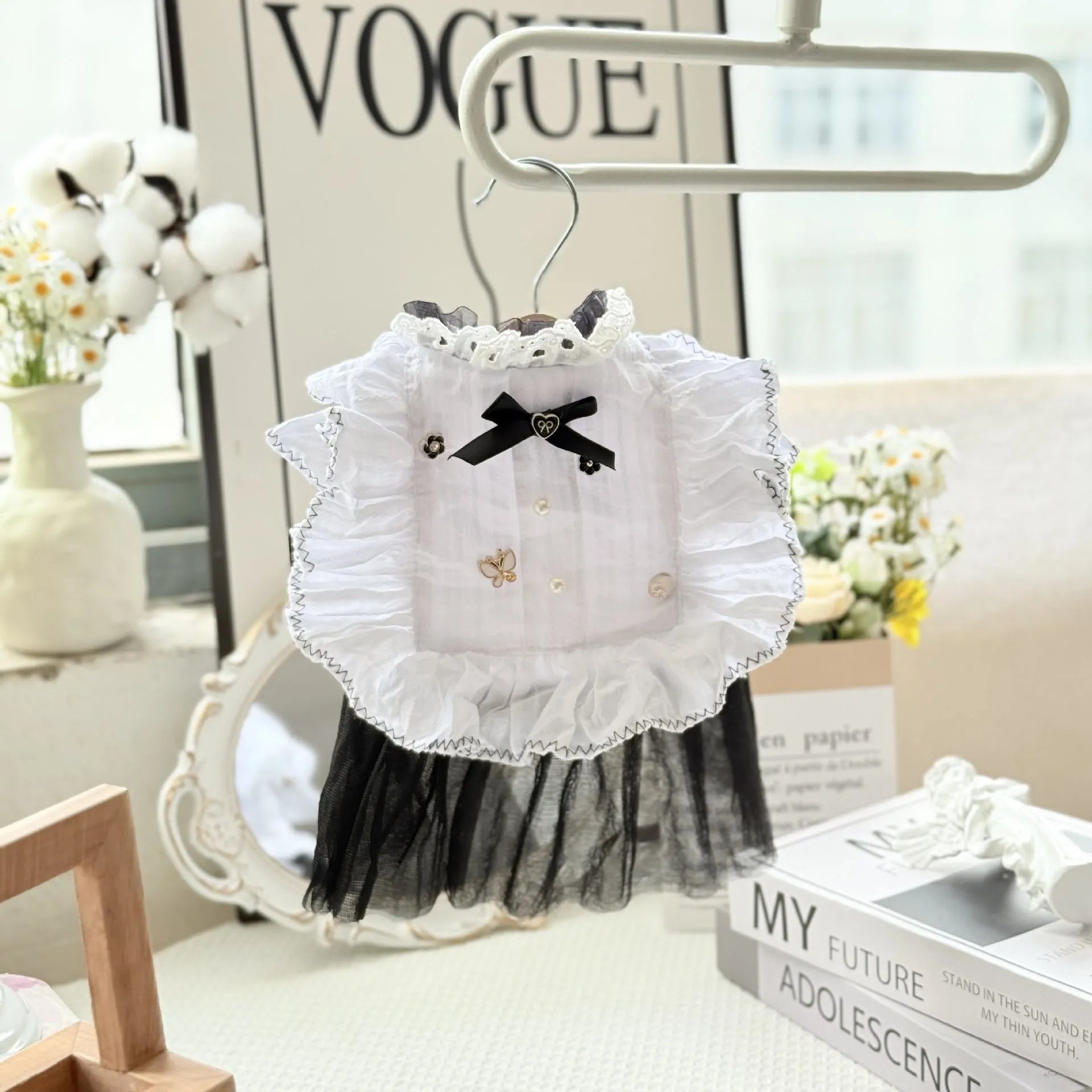 White yarn-textured gauze skirt for a small dog, shown in a princess-style fit on a pet.