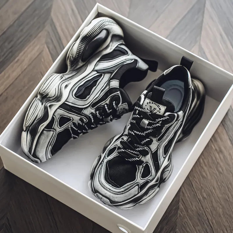 Men's black and grey mesh platform sneakers with a round toe and lace-up front on a rubber sole.