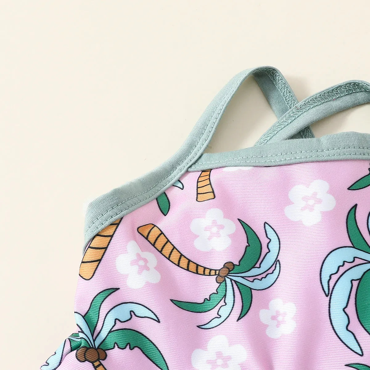 Girls' white two-piece swimsuit set with a top and shorts, made from polyester.
