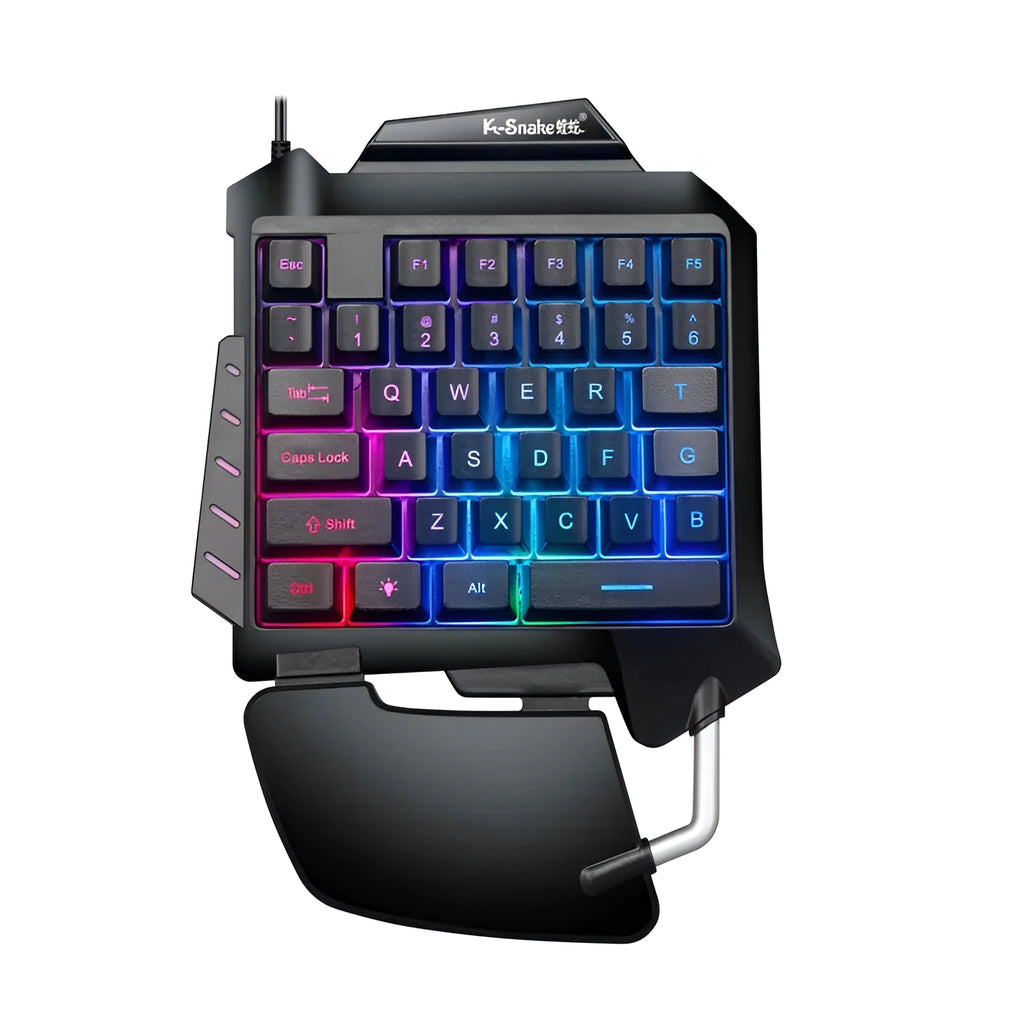 Black left-hand throne one-handed gaming keyboard with shortcut keys and wrist rest on a desktop.