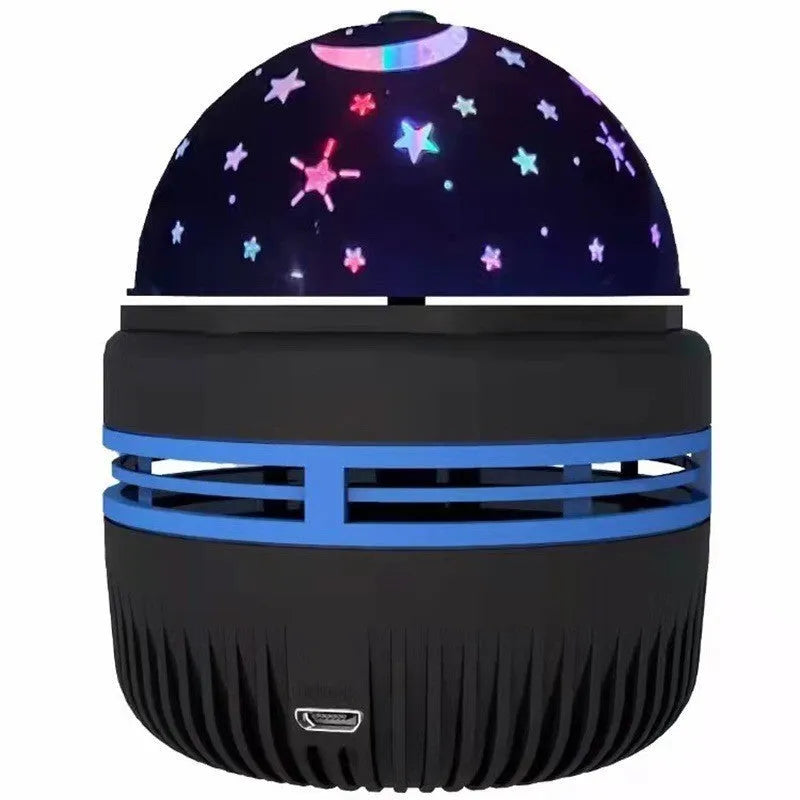 LED star galaxy projector lamp with colourful rotating light on a dark surface