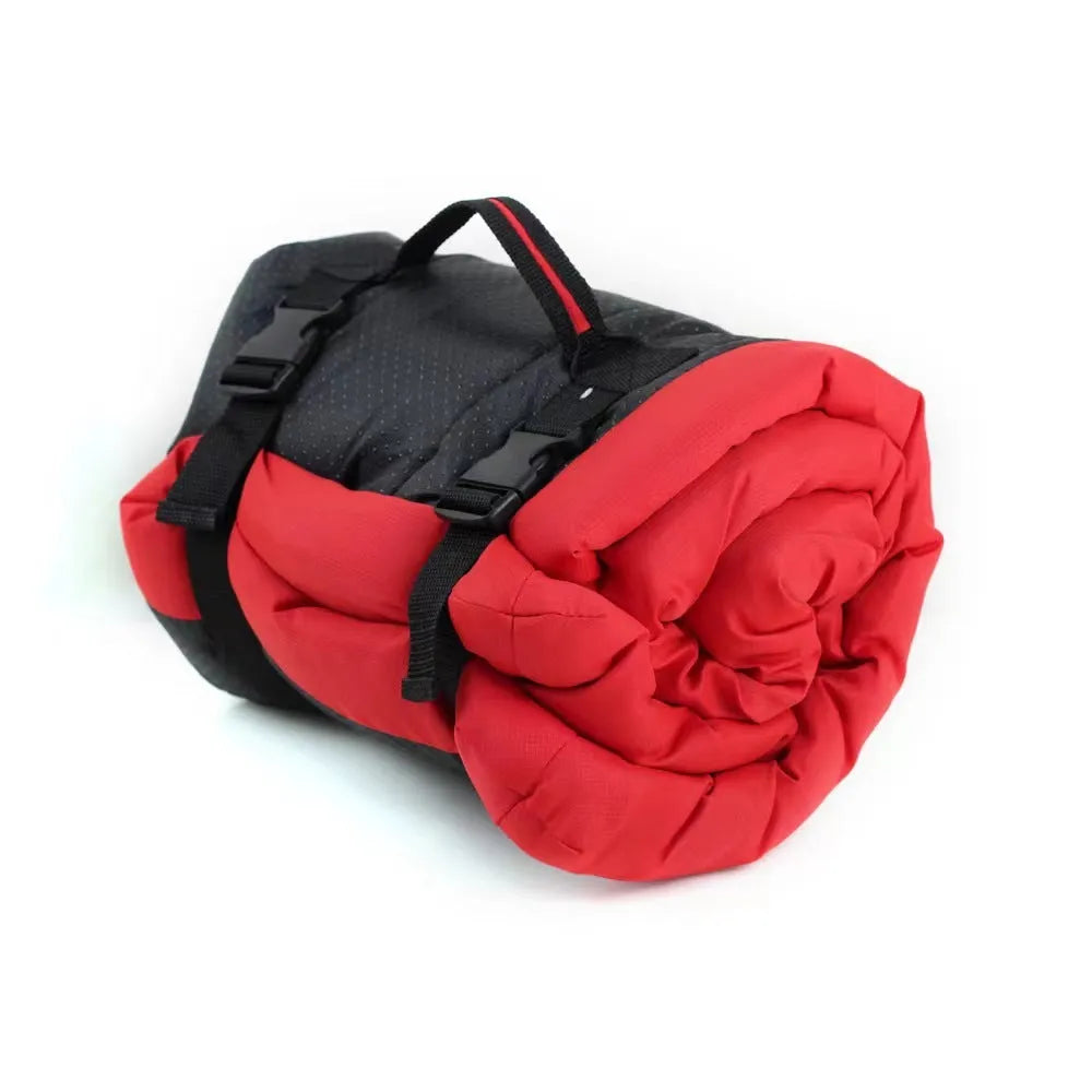 Blue foldable waterproof dog bed shown unfolded and folded, with nylon buckles and dotted anti-slip bottom.