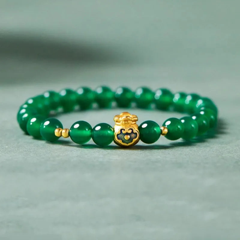 Green turquoise bead bracelet with 8mm geometric beads and silver accent