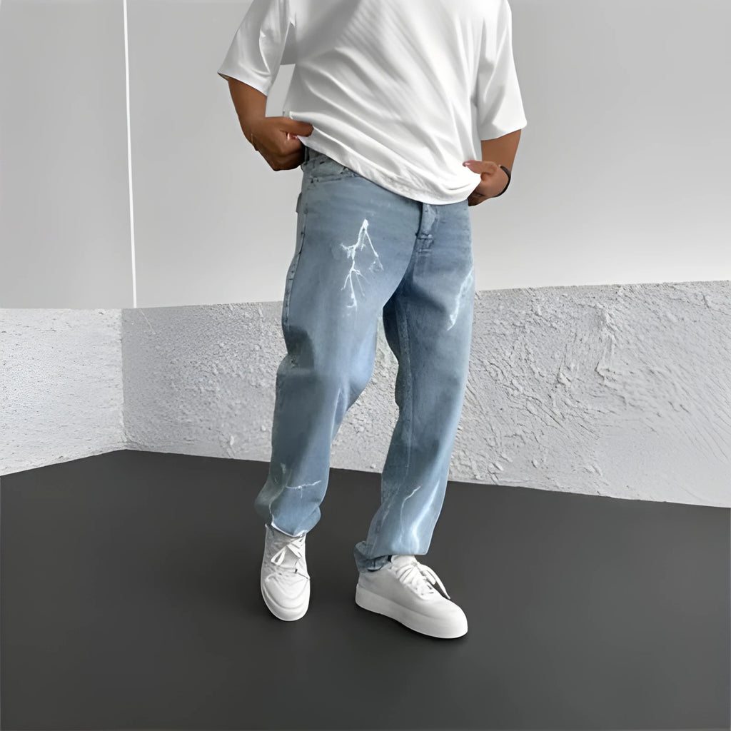 Men's blue straight-leg jeans with loose wide-leg fit and mid-rise waist