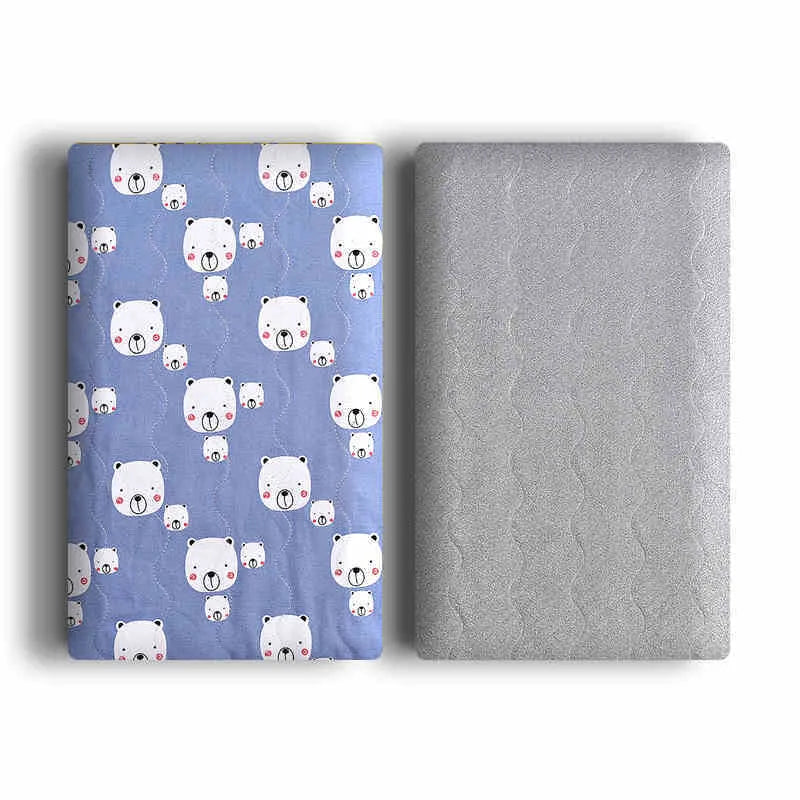 Double-sided cotton velvet pet blanket with dinosaur print, shown in a dog bed.