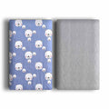 Double-sided cotton velvet pet blanket with dinosaur print, shown in a dog bed.