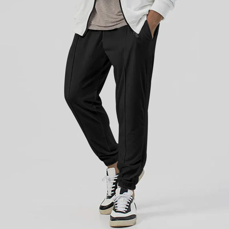 Men's grey cotton blend straight-leg track sweatpants with a tapered fit and elasticated waist.