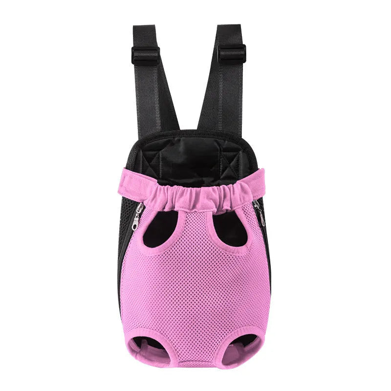 A person wearing an adjustable black nylon dog carrier backpack on their front, containing a small dog looking out.