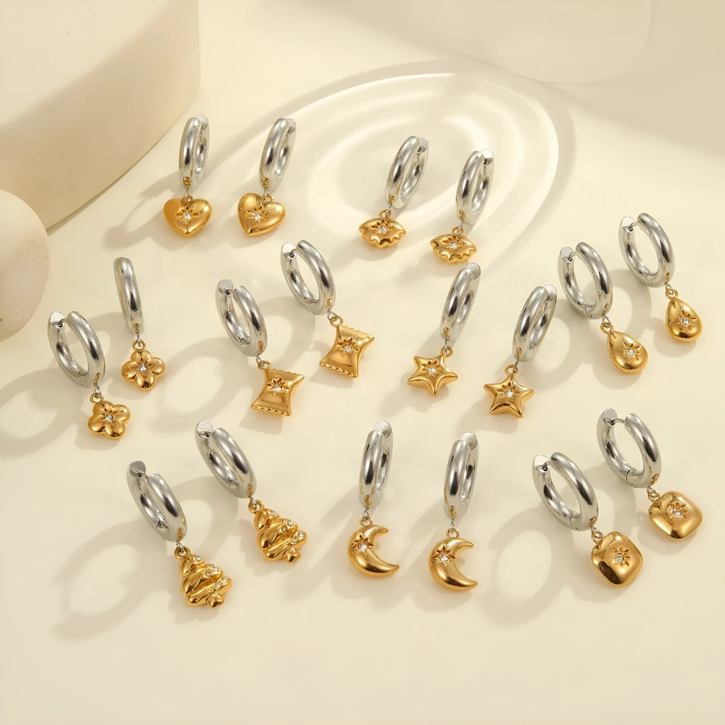 Stainless steel geometric earrings with 18K electroplated finish showing heart and star shapes