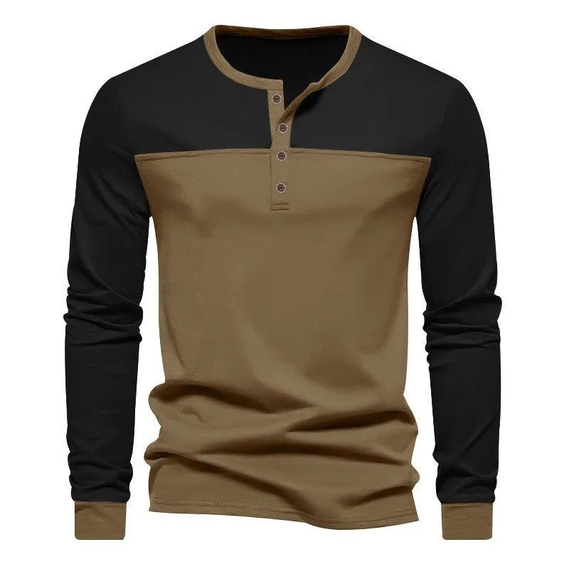 Man wearing a long-sleeve henley collar casual shirt in a solid colour with textured beaded twill fabric.