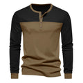 Man wearing a long-sleeve henley collar casual shirt in a solid colour with textured beaded twill fabric.