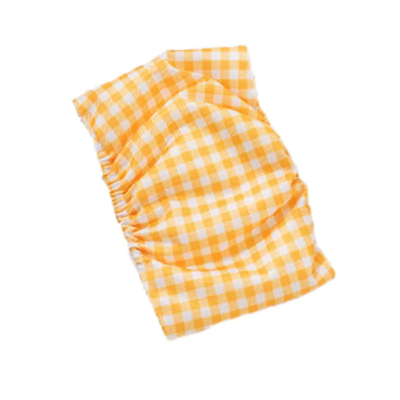 Reusable cartoon bone print dog diaper with fastener tape and elastic waistband, shown in blue bear pattern.