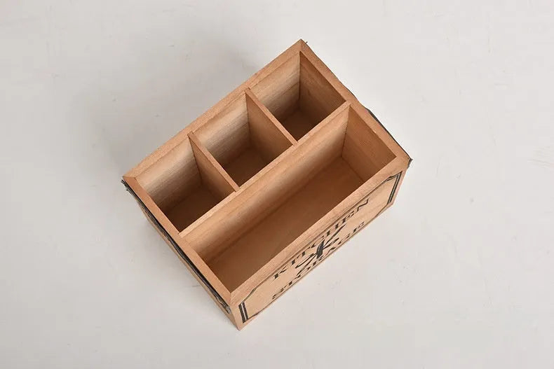 Modern solid-colour wooden kitchen storage box for knives, forks, and chopsticks with an internal grid.